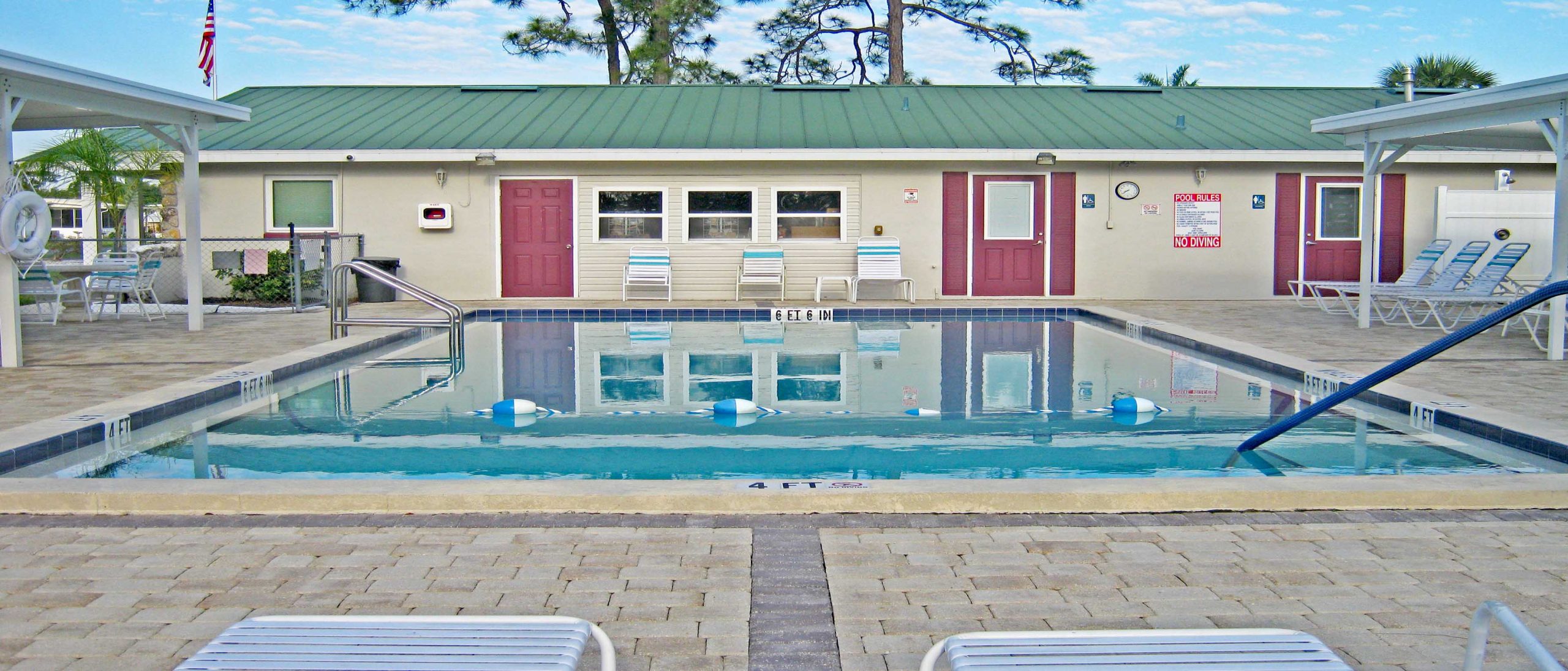 pool with chairs outside